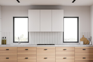 White kitchen with wooden countertop