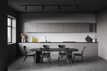 White and grey kitchen interior with table
