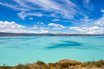 Lake Tekapo with turquoise colored water in a sunny day