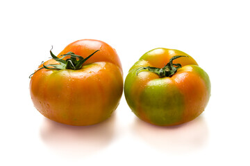 Ripe green tomato on white background