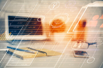 Double exposure of desktop computer and technology theme hologram. Concept of software development.