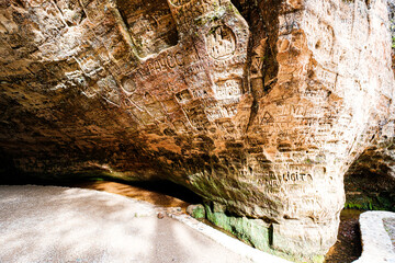 Gutmanis Cave in Latvia. On the walls of the cave are inscriptions from the 17th century. The legend of the Rose of Turaida began in this cave.