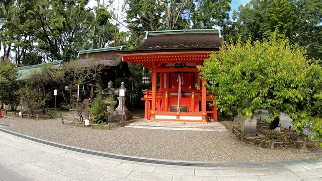Traditional white paper lightings (chochin) along the roof of Kitano Tenmangu shrine. Kyoto. Japan
