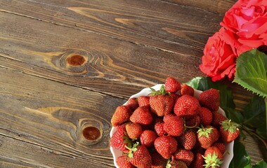 strawberries on wooden background