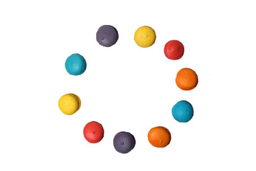 Round frame of macaroons isolated on white background flat lay. Image contains copy space