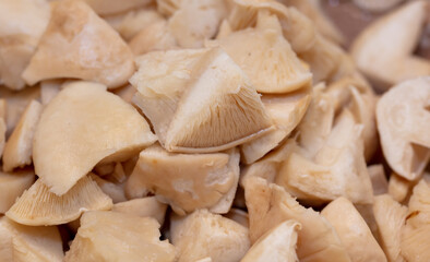 Sliced porcini mushrooms as a background.
