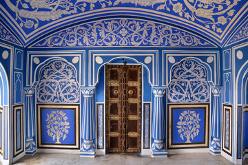 The Blue Palace in Chandra Mahal are beautifully adorned with blue and white coloured rooms in city palace jaipur, rajasthan, india April 2018. This room was used to enjoy the monsoon rain.