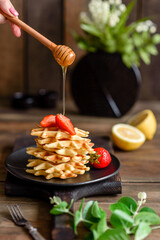 Delicious fresh baked belgian waffles with berries