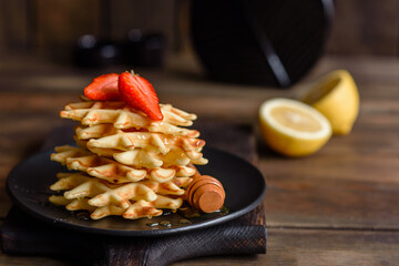 Delicious fresh baked belgian waffles with berries