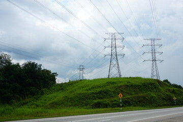 Electricity pylons and power lines.