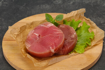 Raw tuna round steak for grill