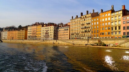Fototapeta premium Europe, France, Auvergne Rhone Alpes region, city of Lyon, facade of building along the river