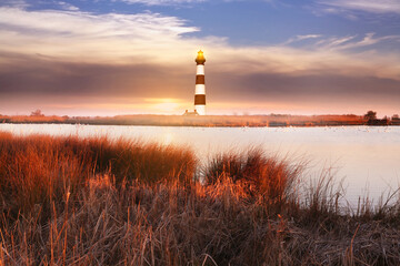 The lighthouse with marshlands in Outerbanks NC, USA. Soft blurry background. 
