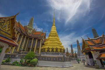 Fototapeta premium Temple of the Emerald Buddha - Wat Phra Si Rattana Satsadaram / Wat Phra Kaew-Bangkok: June 13, 2020, tourists visit to see the beauty of The Grand Palace, in Phra Nakhon District, Thailand.