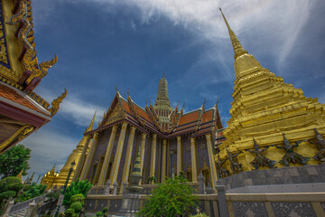 Naklejka premium Temple of the Emerald Buddha - Wat Phra Si Rattana Satsadaram / Wat Phra Kaew-Bangkok: June 13, 2020, tourists visit to see the beauty of The Grand Palace, in Phra Nakhon District, Thailand.
