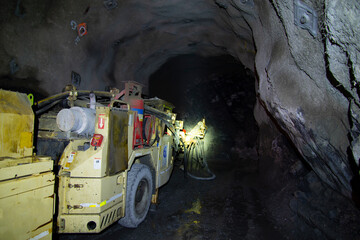 Shotcrete Machine in a Mining Tunnel