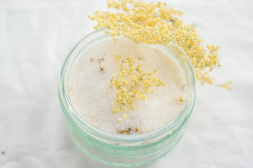 sweet home made lemon elderflower sugar in a glas