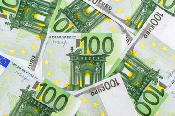 Financial background of one hundred euro banknotes.