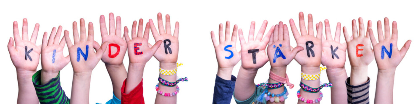 Children Hands Building Colorful German Word Kinder Staerken Means Strengthen Children. White Isolated Background