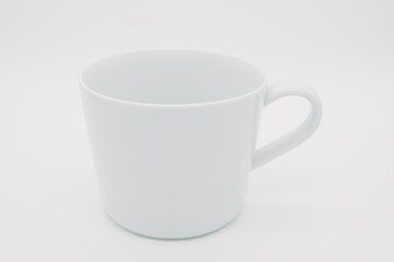 white cup on white background