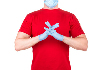 Man in red t-shirt with blue face mask and gloves praying to god isolated