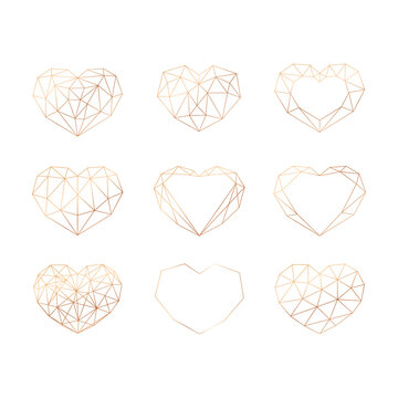 Set of gold geometric polygonal hearts. Vector icons isolated on white background