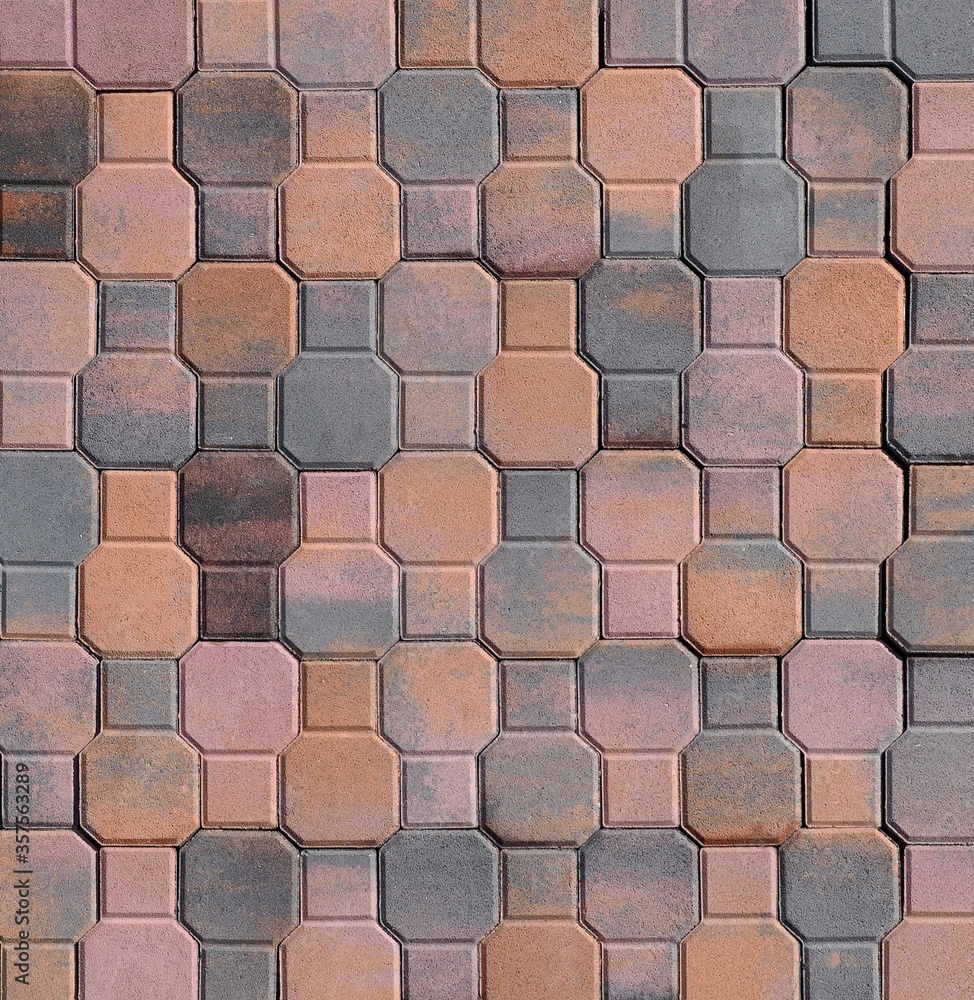 Wall mural tiles for outdoor floorings and pavement made in the shape of octagons and squares .colors are pink,