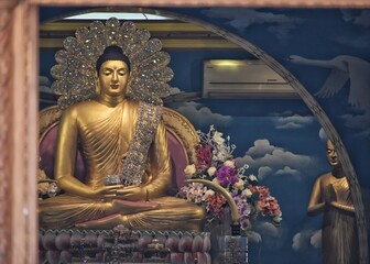 golden statue of buddha in the temple