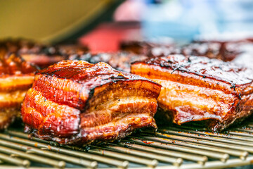 Fresh, delicious grilled meat. Grilling steak on BBQ. Close up view of grilling steak.