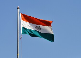 unfurled flag of India in air 