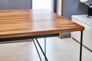 Fototapeta na wymiar Wooden office desk. Walnut veneer desk with metal base