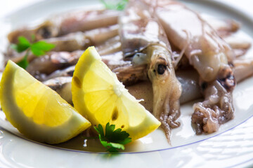 squid or fresh cuttlefish with parsley and lemon