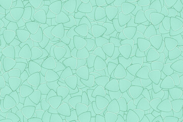 Seamless background on a musical theme from guitar picks of bright color