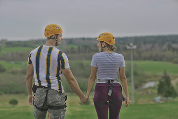friends activity group youth helmets extreme back view team building concept success
