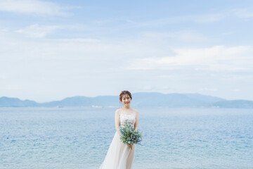 Fototapeta na wymiar 海辺の花嫁