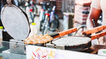 Pancake on frying pan street food sweets