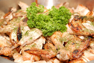 Peri peri chicken with parsley leaves