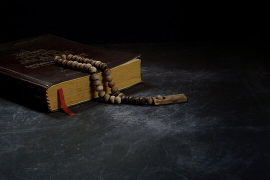 Quran holy book of muslims and prayer beads / tasbih