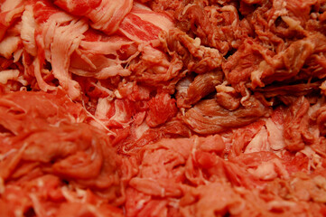Raw fatty beef and bacon pork meat ingredients for hot pot soup mix