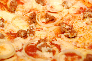 Pizza barcelona with pepperoni, cheese, meat, and onions