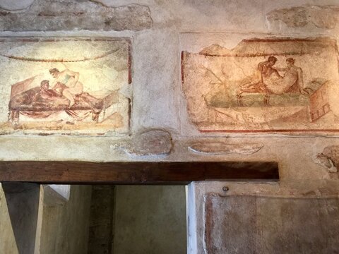 Erotic frescos of lupanar, the ancient Roman brothel in Pompeii