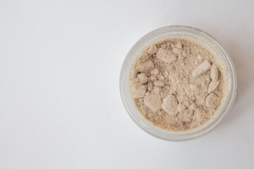 Texture of makeup powder - blush or eyeshadow. Mineral make-up cosmetics close-up isolated on white background