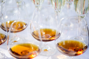 Glasses of alcohol close- up before a party in a cafe
