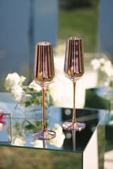 Wedding glasses with champagne on the table
