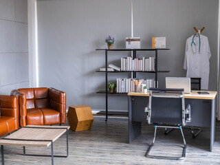 Doctor workplace in office. Modern interior of doctor's office of gynecologist in a clinic. Clean and light interior of medical office.