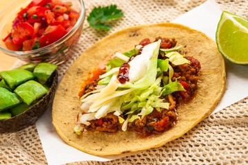 Mexican homemade taco burrito pulled pork with tomato salad  guacamole