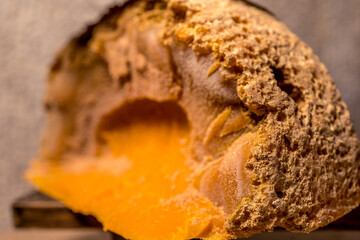 Cheese gourmet Mimolette. Healthy food background. Healthy fresh nutrition. Soft focus.
