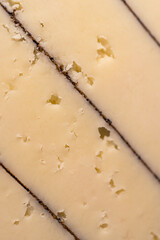 Cheese with truffles. Macro closeup. Delicious expensive cheese. High quality photo