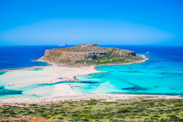 Balos Bay in Crete, Greece. Turquoise, clear sea view. Nature around the island. Famous tourist destination. Beautiful lagoon.