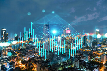 Night time view cityscape of Bangkok city background with financial graph. Success and finance concept. Multiexposure